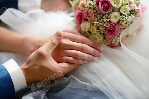 Preview: Wedding couple is holding hands