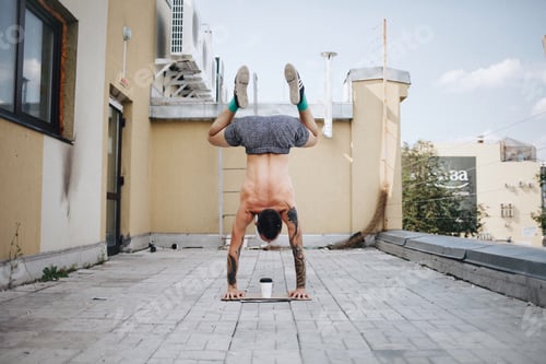 Preview: man dancing on the roof / dancer / gymnast