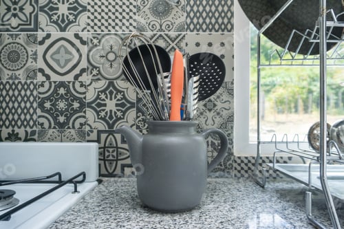 Preview: Kitchen utensils on the countertop in the modern kitchen