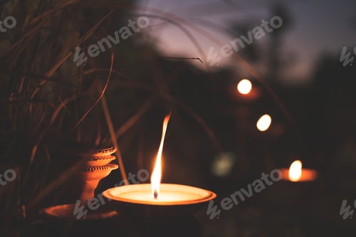 Preview: candle fire lamp decoration concept, candle with light of fire setting at cozy home outdoor