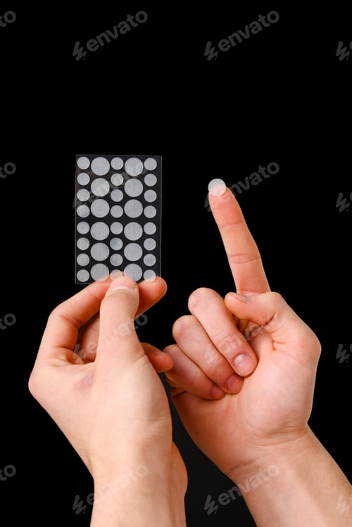 Preview: Acne patch skincare concept without medication on dark background