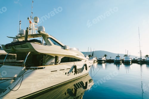 Preview: White motor yacht at the pier in Porto Montenegro