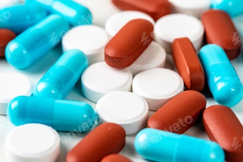Preview: Closeup of different types of medicines on the table. Concept of medical treatment, healthcare.
