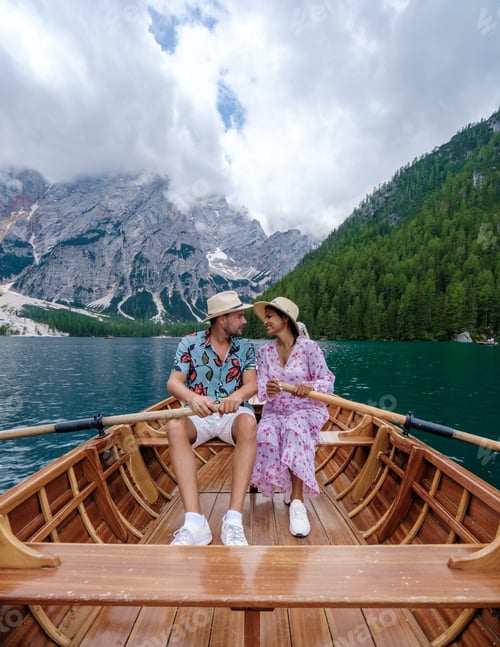 Preview: couple visit Braies Lake Lago di Braies Italian Dolomites alpine lake Italy, Europe