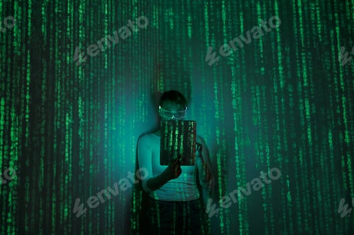 Preview: Woman in futuristic glasses using digital tablet against dark background with green symbols