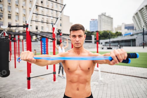 Preview: Shapely topless man with skipping rope outdoors