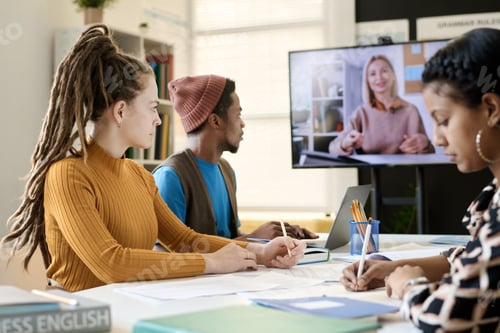 Preview: Students Watching Online Lesson in Class
