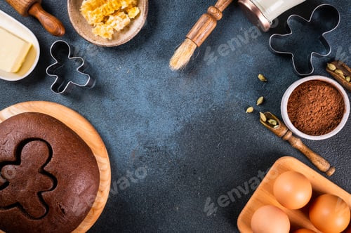 Preview: Christmas Baking background. Ingredients for cooking christmas baking on dark background.