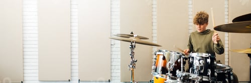 Preview: Young Drummer Playing Drums Wide Banner with Copy Space
