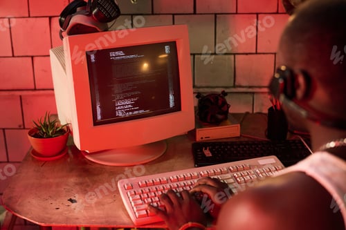 Preview: Unrecognizable Black Man Hacking Computer Program