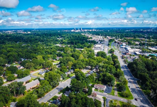Preview: High angle shot of Greensboro on a partly cloudy day