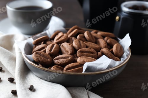 Preview: Concept of tasty snack for hot drink - cookies in the shape of coffee seeds