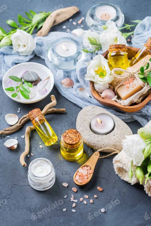 Preview: Spa wellness setting concept with spring flowers, black background