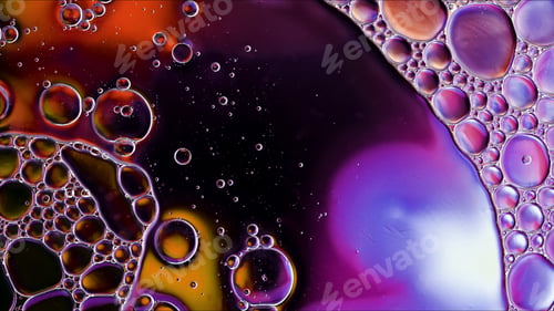 Preview: Abstract Colorful Food Oil Drops Bubbles and spheres Flowing on Water Surface