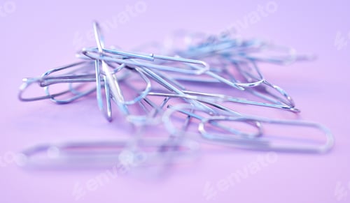 Preview: chained paperclips on the purple background
