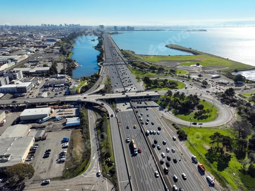 Aerial top-down cityscape view over Berkeley with freeway roads