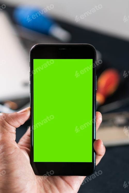 Preview: Smart phone with Green Screen in Hand