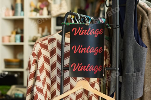 Preview: Vintage Clothing Displaying on Rack Inside Thrift Shop Environment
