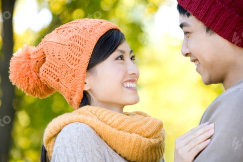 Preview: Young Couple in a Park in Autumn