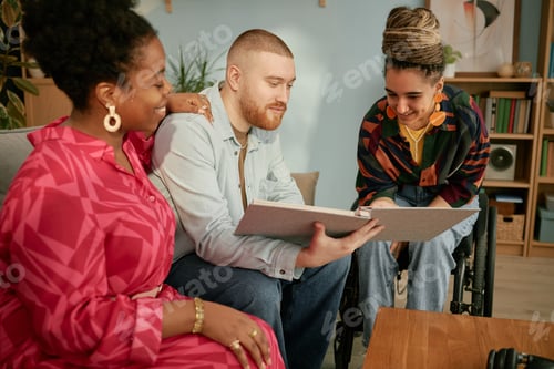 Preview: Diverse Young Adults Celebrating Birthday with Friend in Wheelchair with Disability