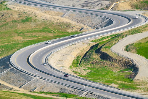 Preview: A winding road through a mountain pass