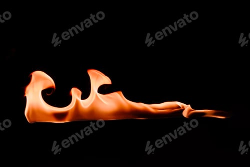 Preview: close up view of burning orange fire on black background