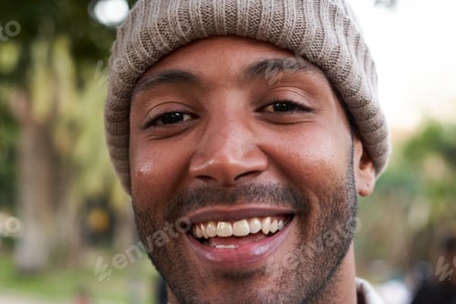 Preview: Portrait of multiracial man smiling and looking at camera.