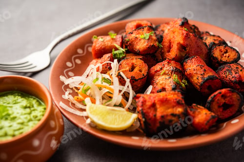 Preview: Tandoori Soya Chaap or soy chap dish prepared by marinating in tandoori spices, closeup view