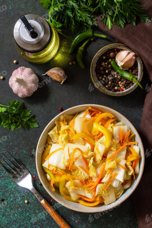 Preview: Korean pickle traditional fermented vegetable, Kimchi cabbage on a stone countertop.