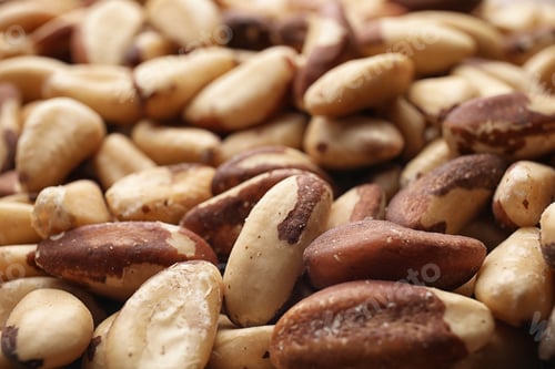 Preview: Many delicious Brazil nuts as background, closeup