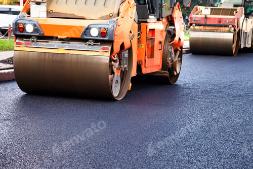 Preview: Paving Asphalt Concrete on a City Street During Urban Road Construction Process