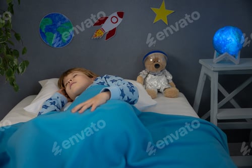 Preview: Happy child sleeping at home