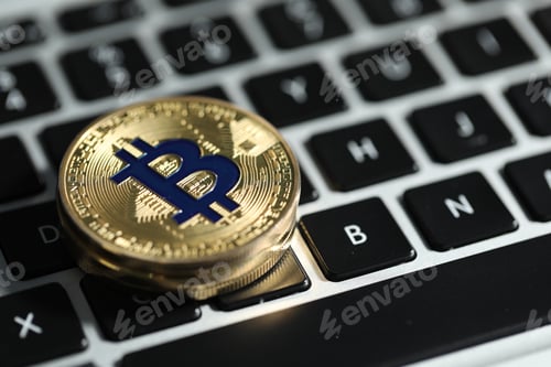 Preview: Cryptocurrency. Golden bitcoins on laptop, closeup. Space for text