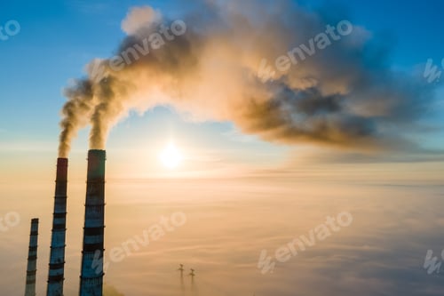 Preview: Aerial view of coal power plant high pipes with black smoke moving up polluting atmosphe