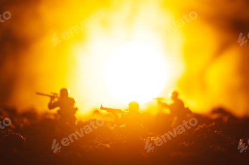 Preview: Battle scene with toy warriors in smoke and sunset at background