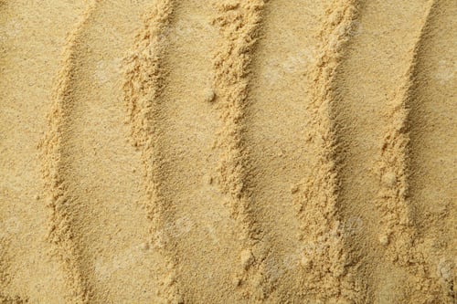 Preview: Superfood. Mustard seeds powder as background, closeup