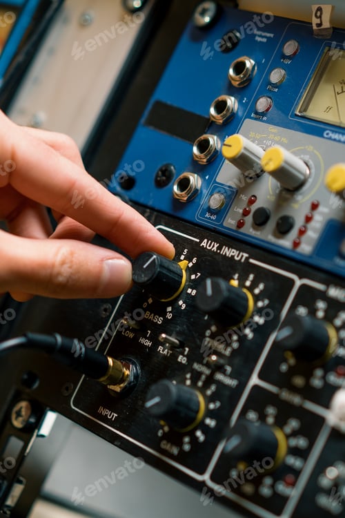 Preview: Sound engineer used digital audio mixer Sliders Engineer presses key Control panel Recording studio