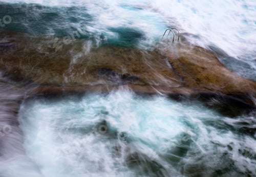 Preview: Stone shore with ladder between water
