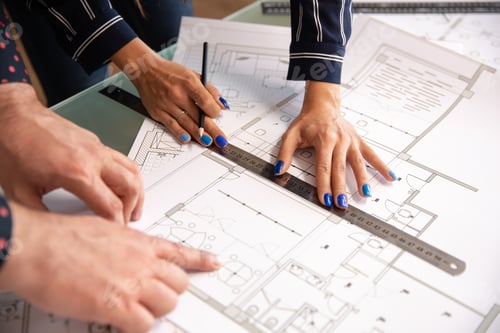 Preview: Close up with the hands of two architects who check something in a house plan