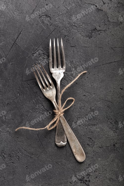 Preview: Vintage Silverware Collection with Rustic Styling on Dark Stone Background