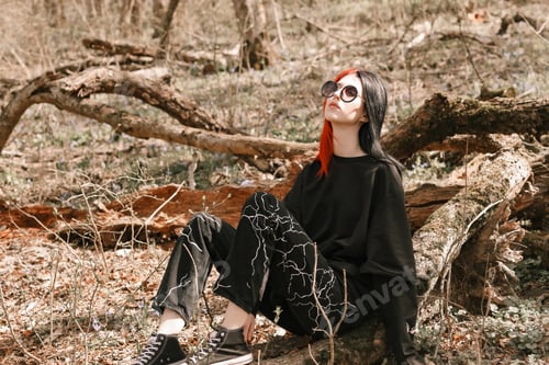 Preview: Portrait of a young girl with red hair