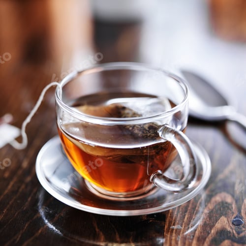 Preview: hot cup of tea steeping in glass