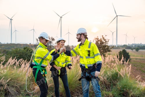 Preview: Engineer at Renewable Energy Windmill Farm, Wind Power for Sustainable Electricity Generation