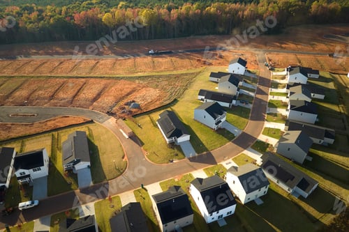 Preview: Aerial view of real estate development with tightly located family houses