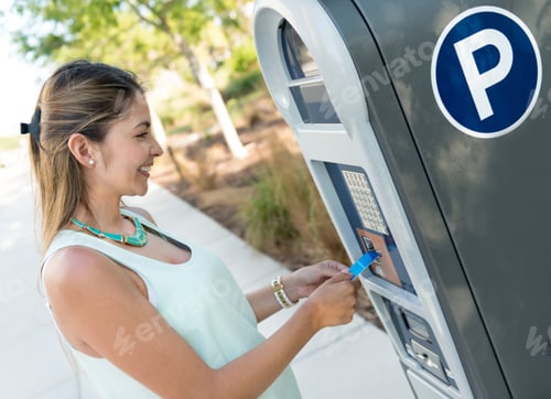 Preview: Woman Paying For Parking With A Debit Card