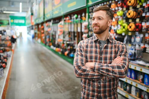 Preview: Young man working in hardware store