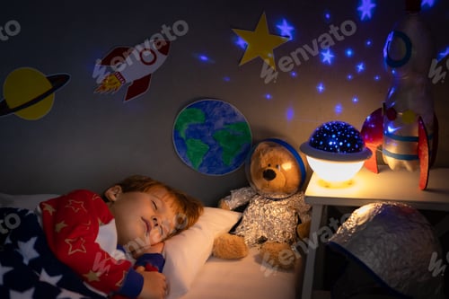 Preview: Happy child sleeping at home