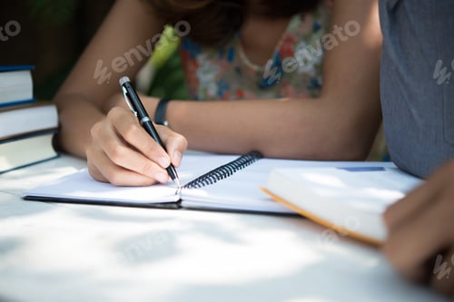 Preview: Education couple sitting at nature home garden, time to reading and tutorial for exam together.
