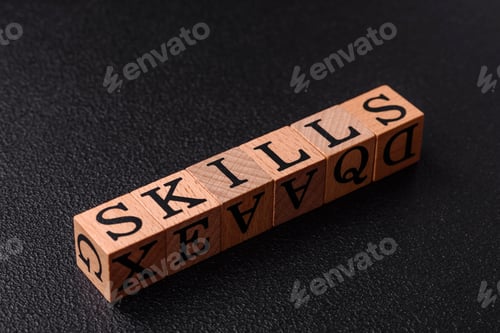 Preview: The inscription Skills made of wooden cubes on a plain background