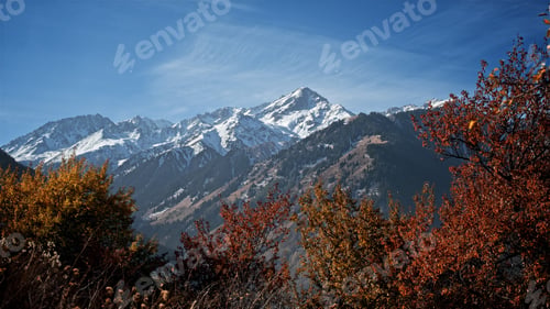 Preview: Snow on tops of the autumn mountains